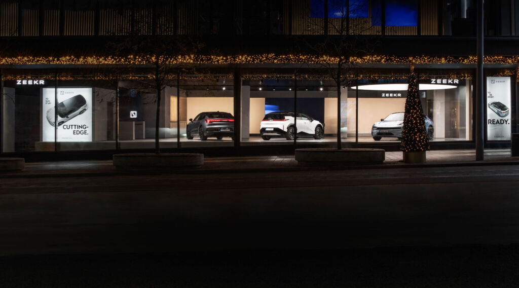 The exterior of the showroom at night