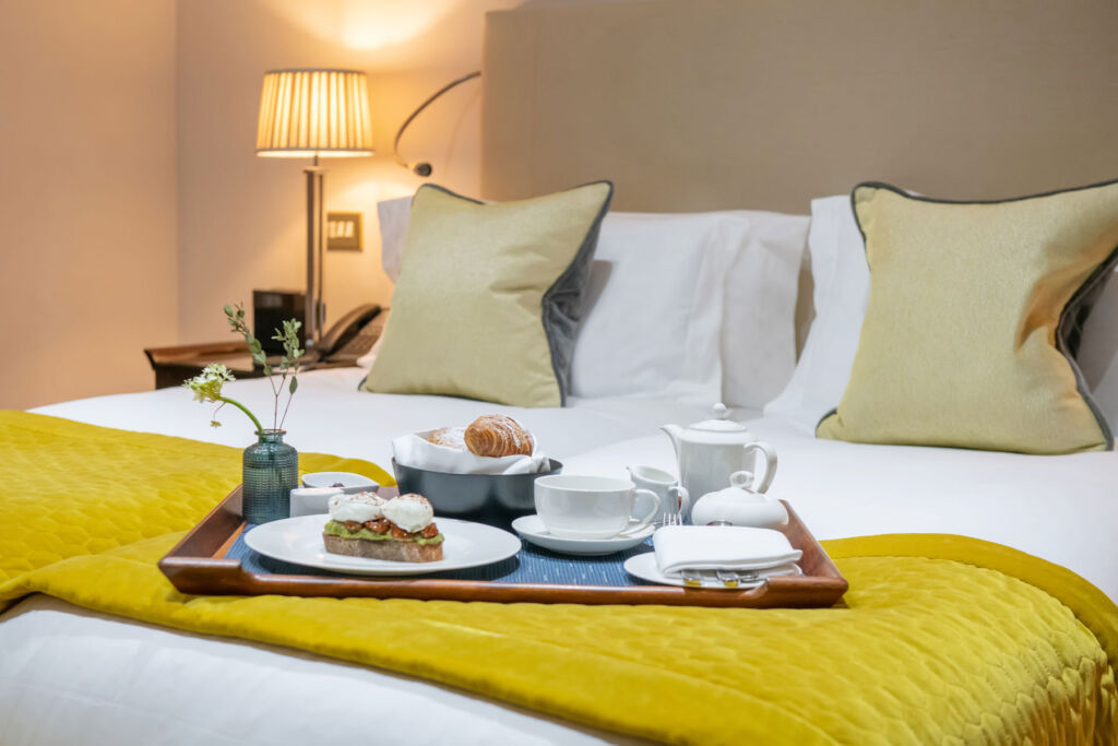 Breakfast in bed in one of the hotel's Deluxe rooms