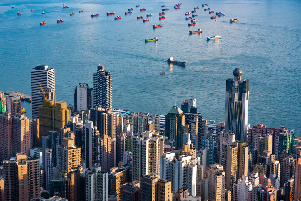 An aerial view of Hong Kong Harbour looking over the high-rise buildings