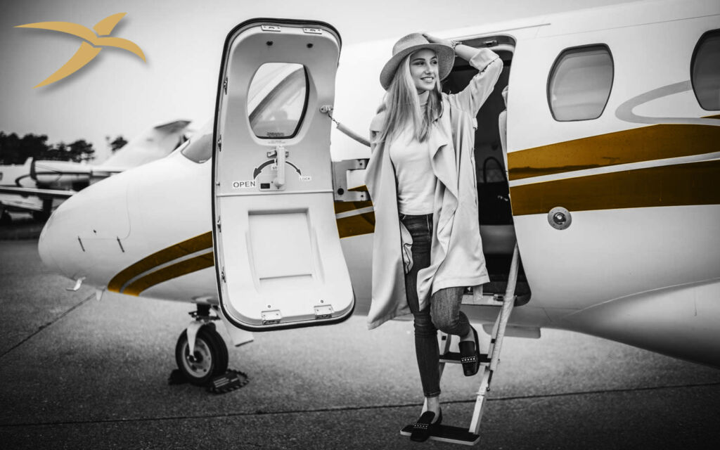 A woman exiting a private jet