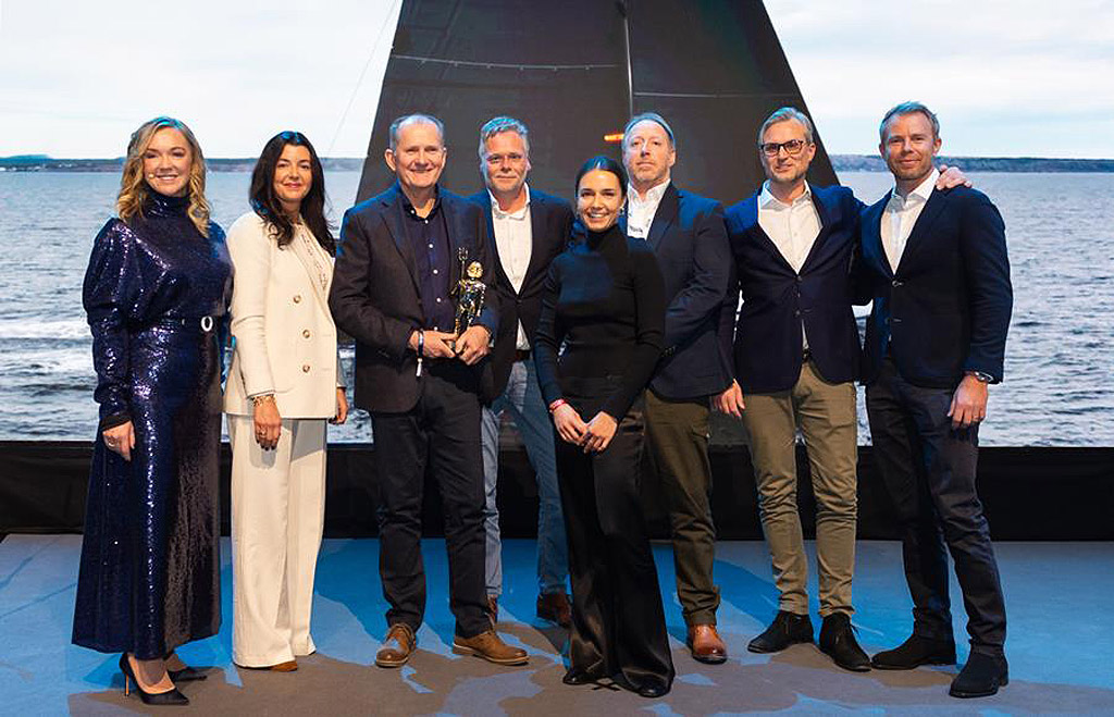 The design team on stage accepting their award