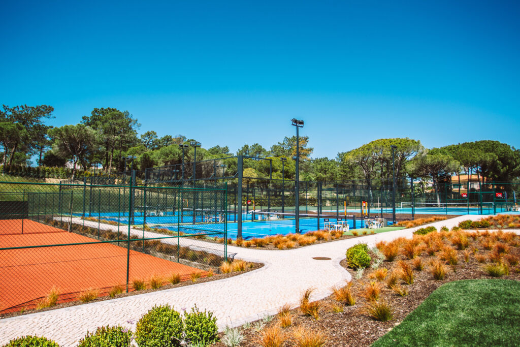 A photograph of some of the tennis courts at the resort