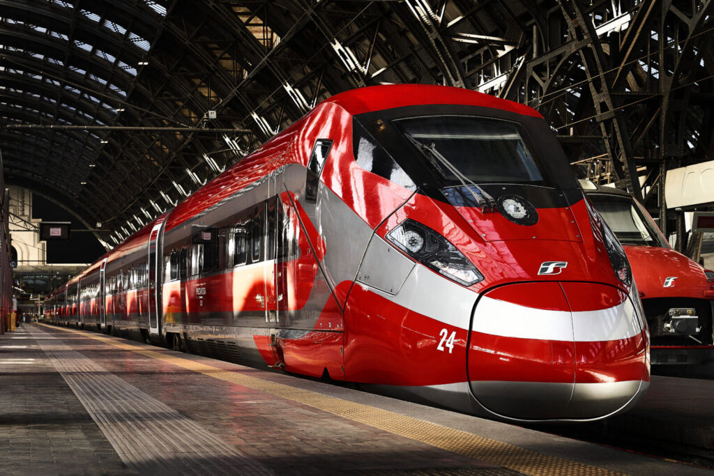 A red coloured high-speed train