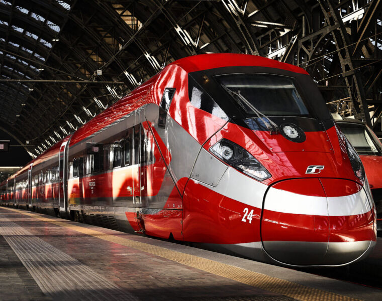 A red coloured high-speed train