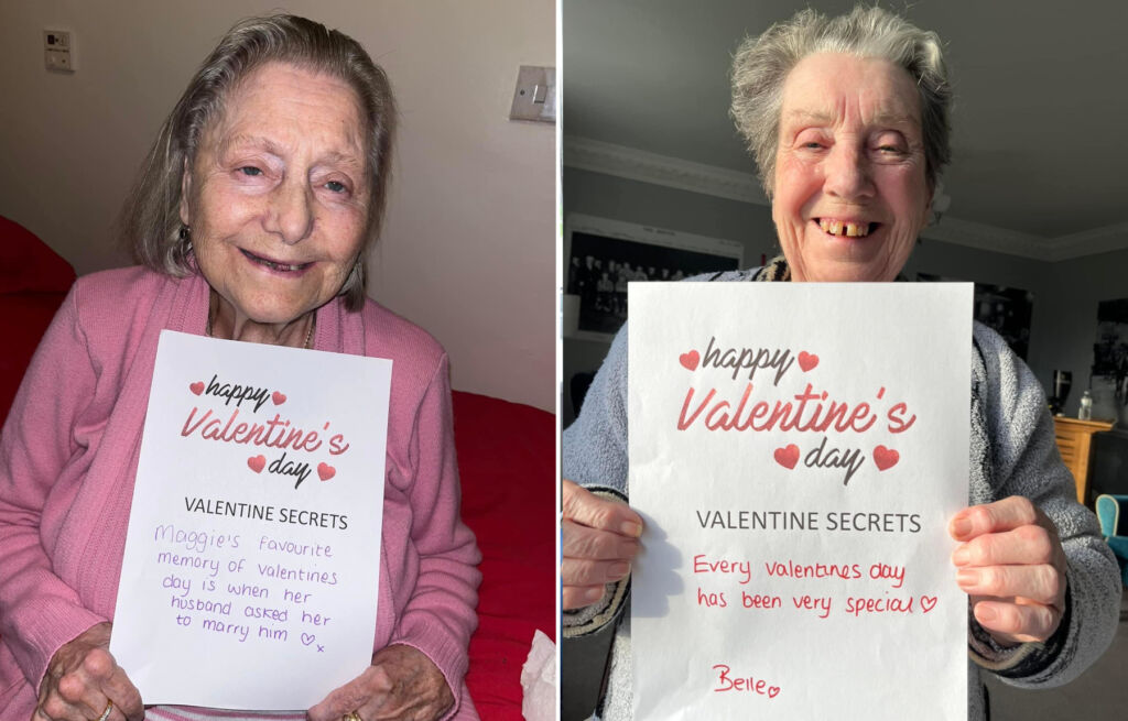 Two residents holding up their Valentine's Day memories
