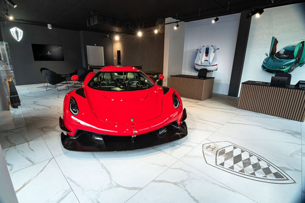 A front on view of one of the company's hypercar's in the showroom