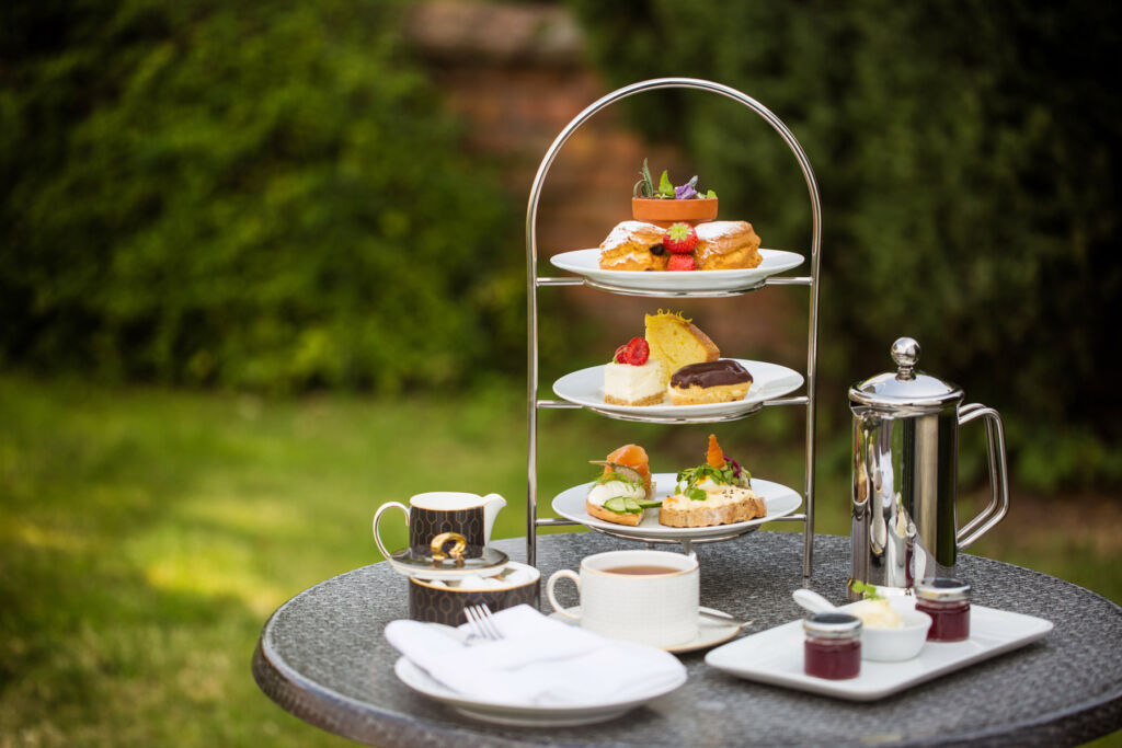 The afternoon tea set on a table in the garden