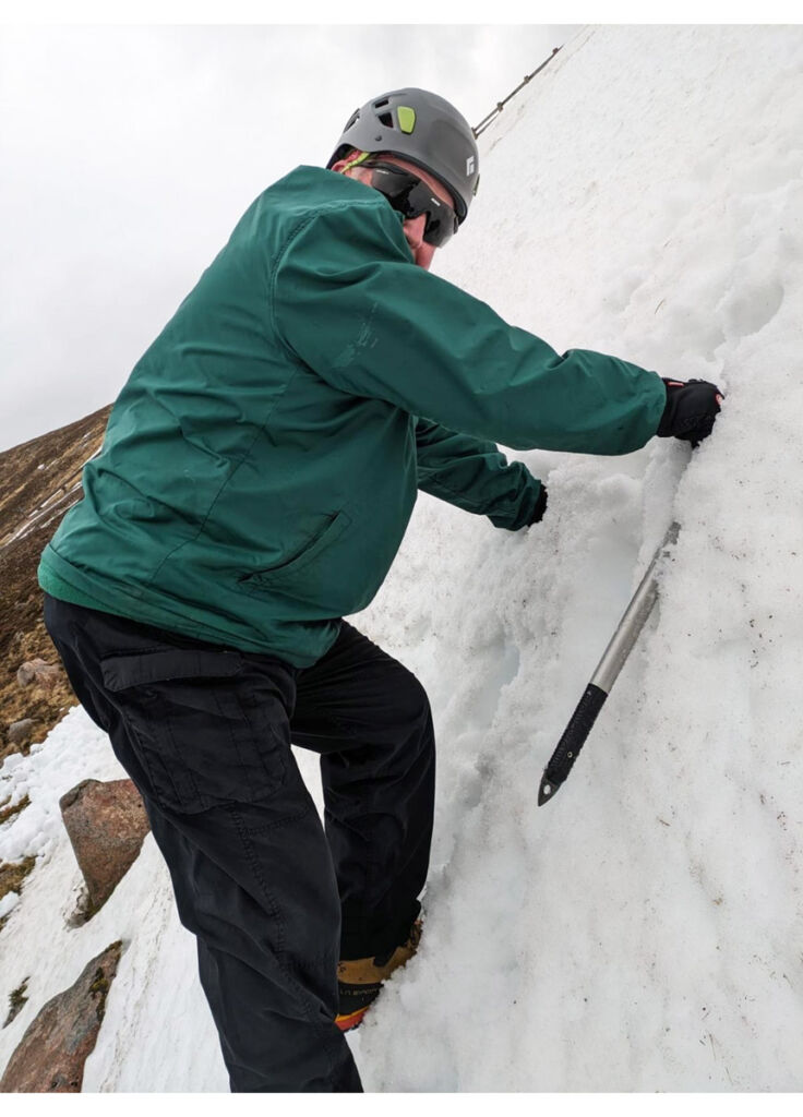 One of the veterans scaling an ice wall