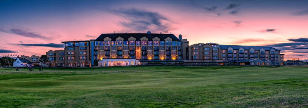 The hotel exterior at sunset