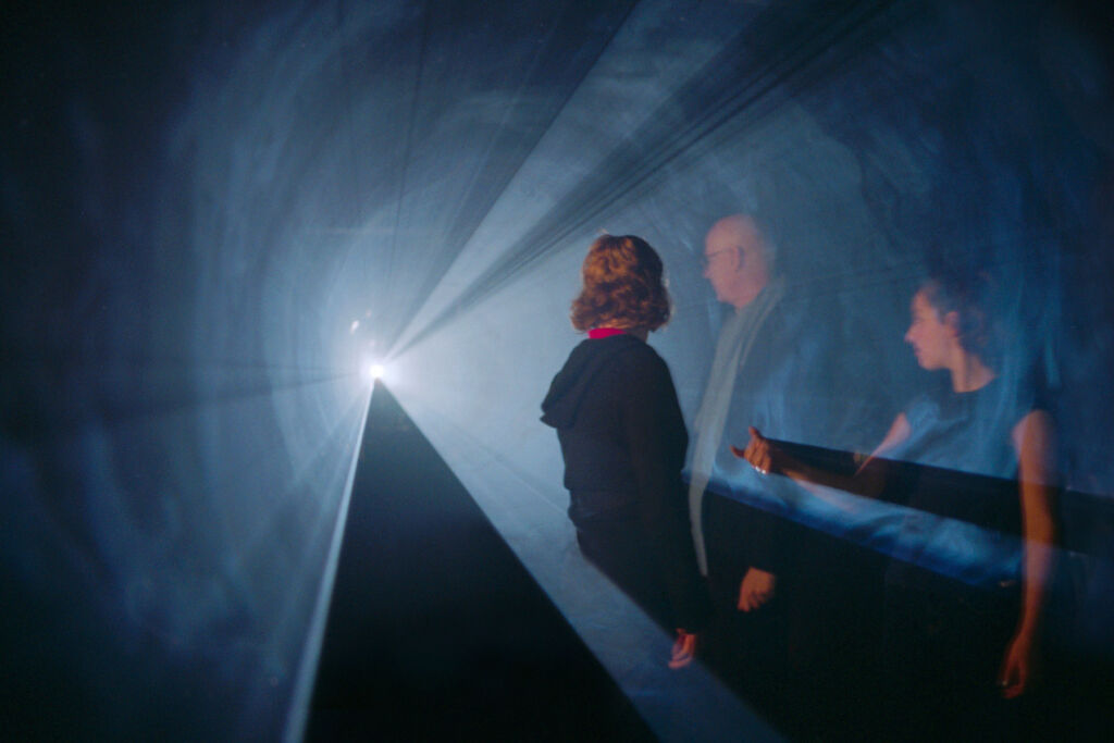 Visitors interacting with the light installations