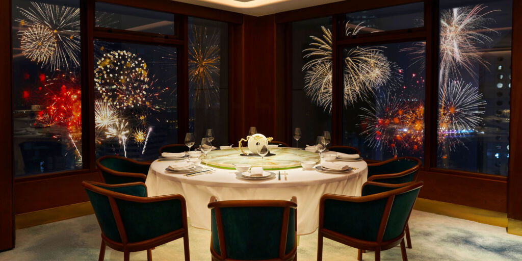 The fireworks display viewed from a table at The Merchants