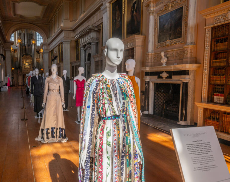 A parade of mannequins adorned with iconic fashion pieces