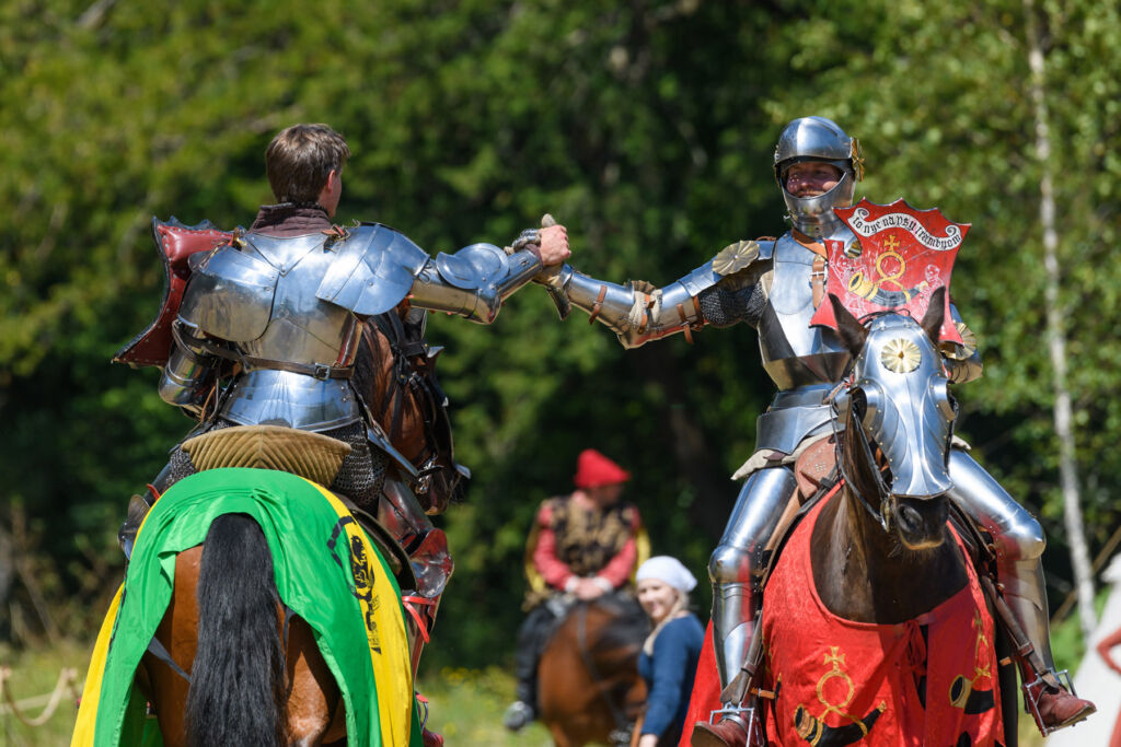 Two Knights shaking hands after a joust
