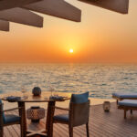 Dining at sunset at a private villa