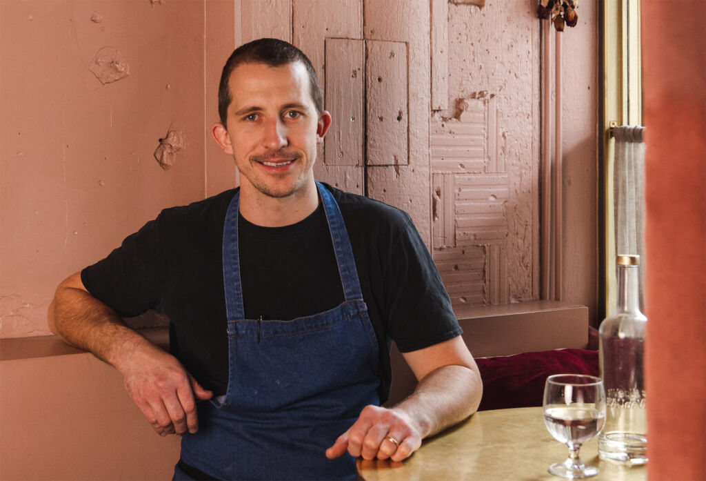 Chef Patrick Williams sat at a table