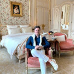 Stefan in a luxury hotel suite