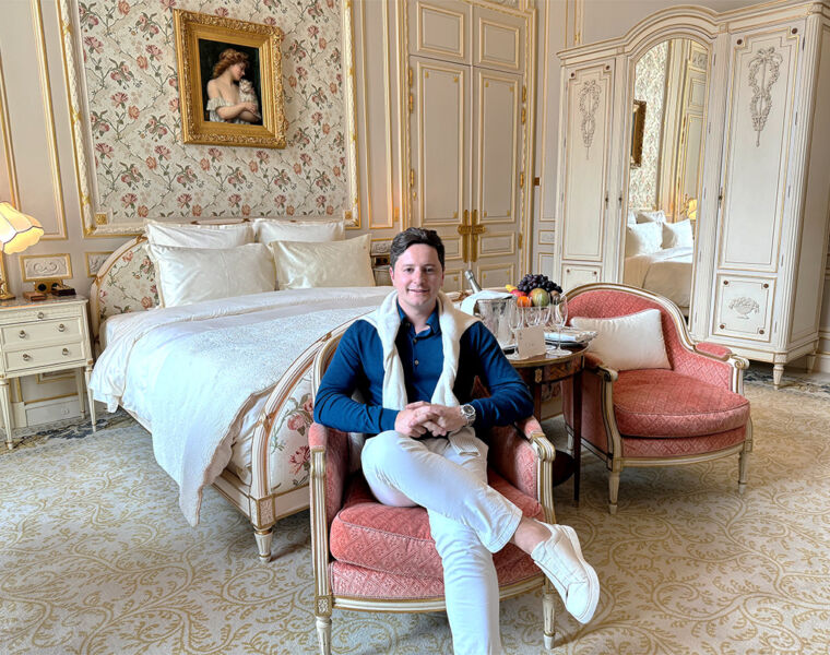 Stefan in a luxury hotel suite