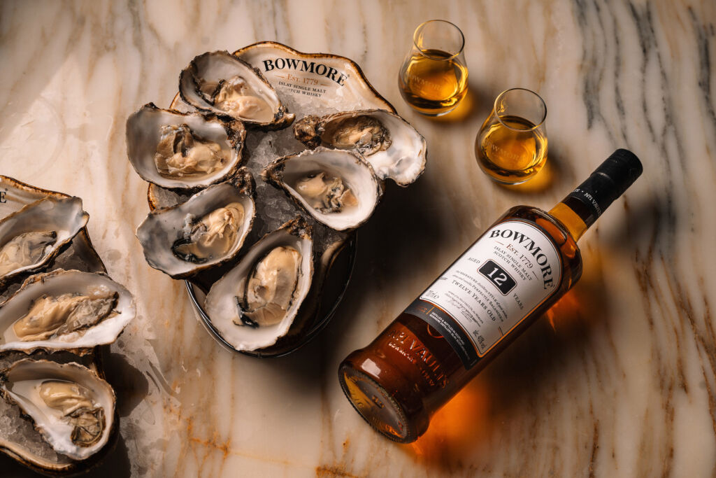 The Luxurious Magazine Whisky Industry News Round-up for June 2024 12 A bottle of the whisky placed on a marble table next to a plate of oysters