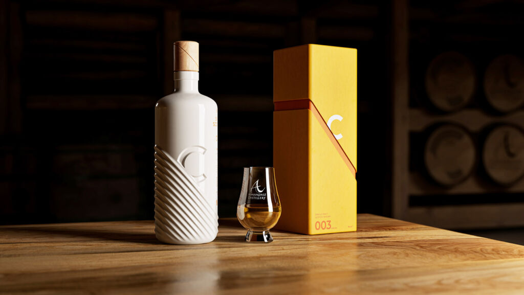 The Luxurious Magazine Whisky Industry News Round-up for June 2024 13 The uniquely designed bottle placed next to its box and a glass of the whisky