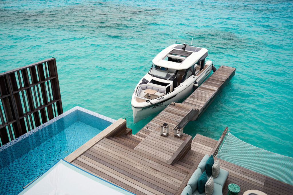 A motor cruiser moored at one of the islands