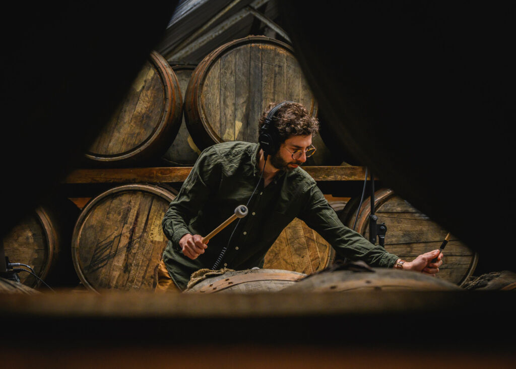 ‘Valley of the Brambles’, Where The Glendronach’s Whisky and Music Intertwine 10 Rob using a drumstick on the side of a cask