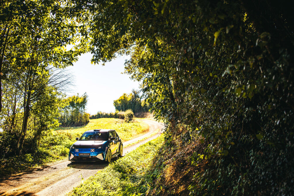 The Alpine A290 Rallye: Where a Rallying Spirit Meets Electric Power 10 The rally car driving through a forest