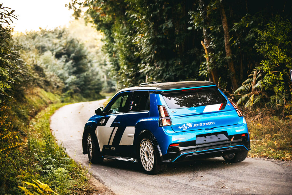 The Alpine A290 Rallye: Where a Rallying Spirit Meets Electric Power 15 The rear of the car being driven through a forest