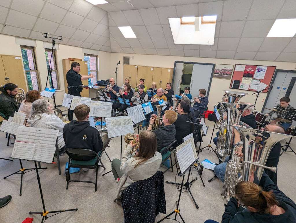 The DMA band playing the music that would be heard on the track