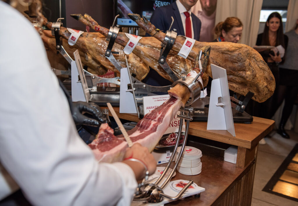 Omar Allibhoy Brings the Soul of Ibérico Ham to British Tables 19 A leg of ham being thinly sliced