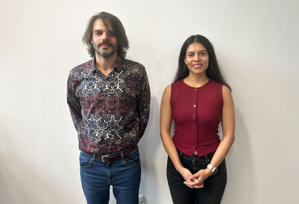 A photograph of William standing with Sachita