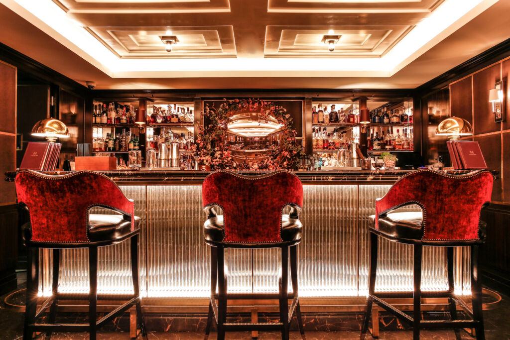 London’s Flemings Mayfair Honoured Once Again with Michelin Key Distinction 7 The red velvet seating at the bar