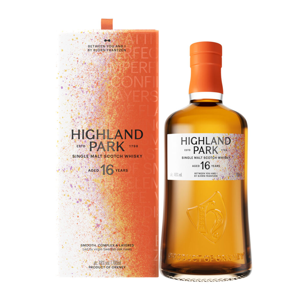 The bottle next to its box