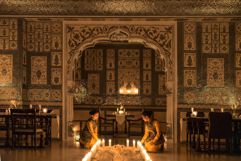 Jamavar Jaipur: Crafting Timeless Luxury Through Indian Culinary Art 9 Candles being lit inside the restaurant