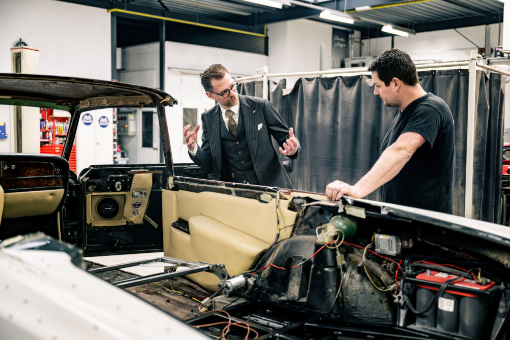 The donor car being prepared for its transformation