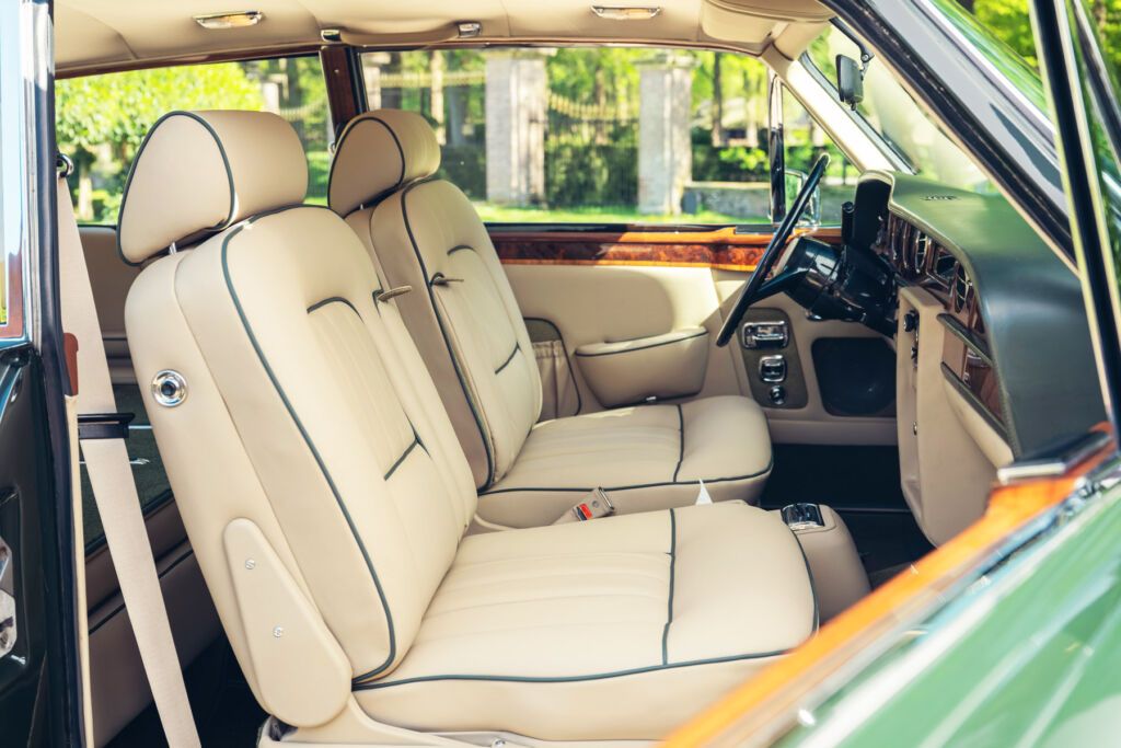 A photograph showing the luxury leather and wood interior