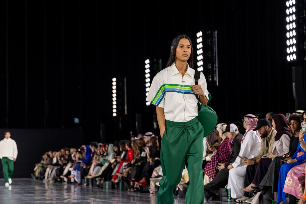 A model waling on the runway wearing items from the collection