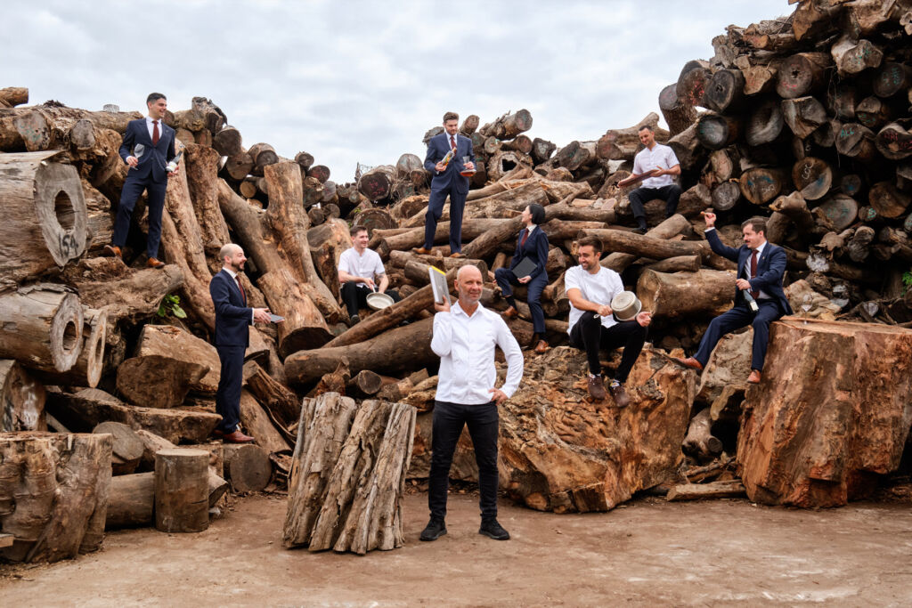 The restaurant team having fun in the timber yard