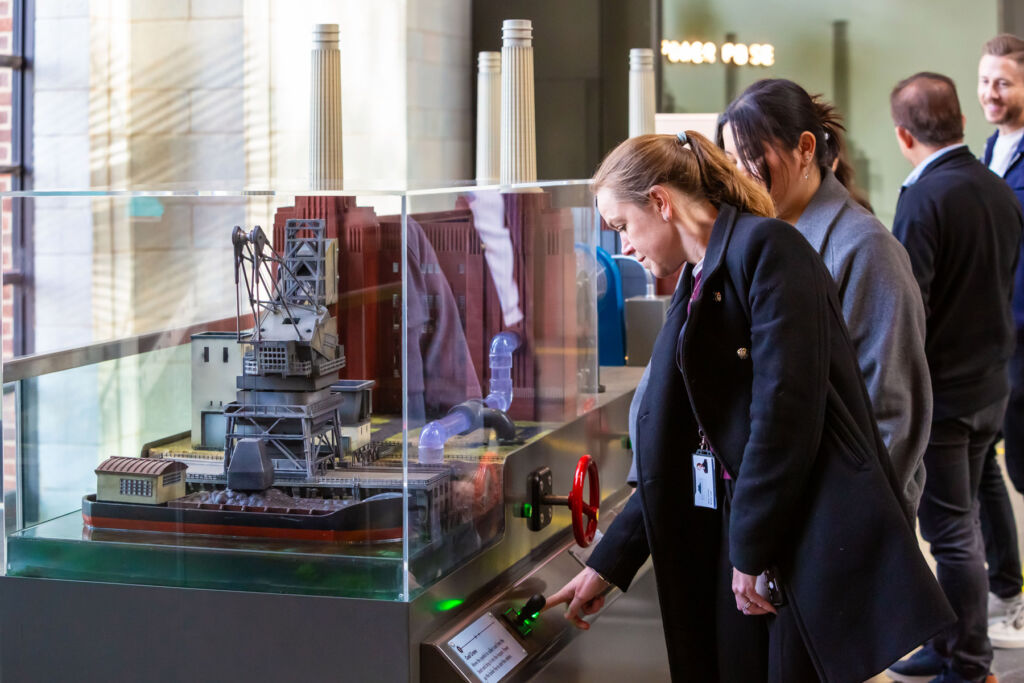 Visitors looking at scale models