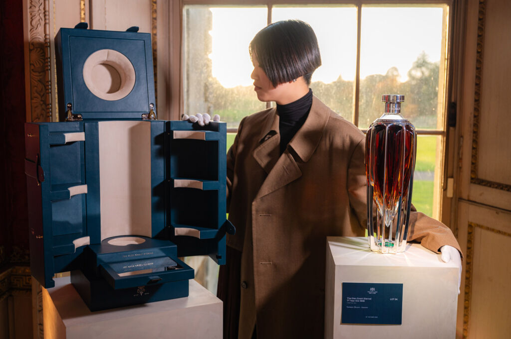 The Glen Grant Eternal next to its large open case