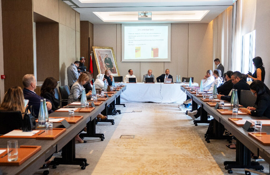 Invitees at a meeting for the launch of latest guide