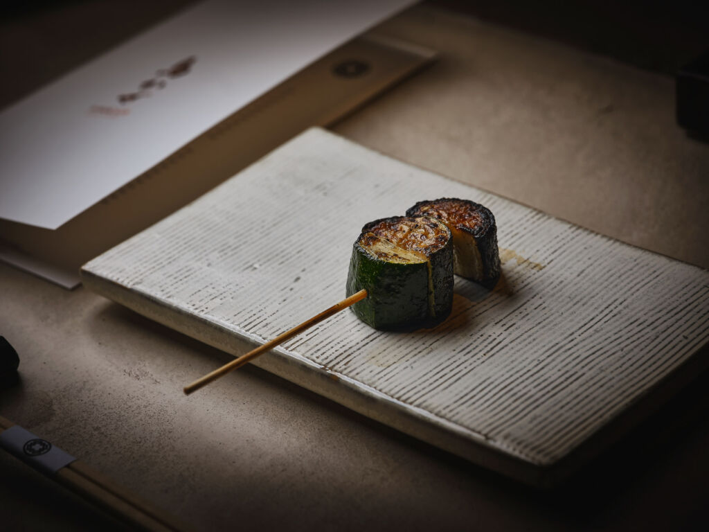 A meat and vegetable skewer ready to be eaten