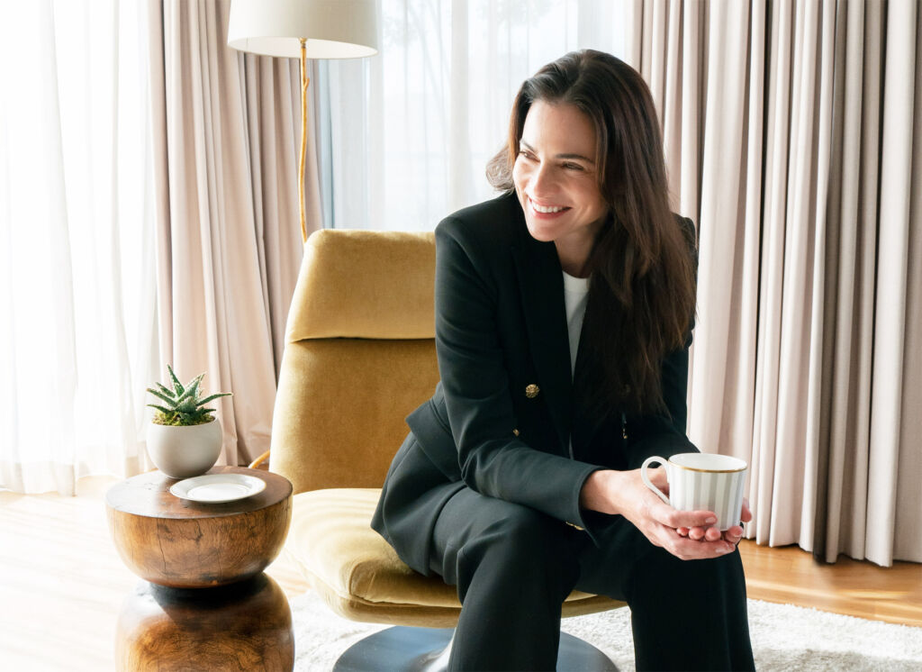 Washington’s The Dupont Circle and Veronica Beard Launch The Blazer Library 10 A smiling woman seated and wearing one of the blazers