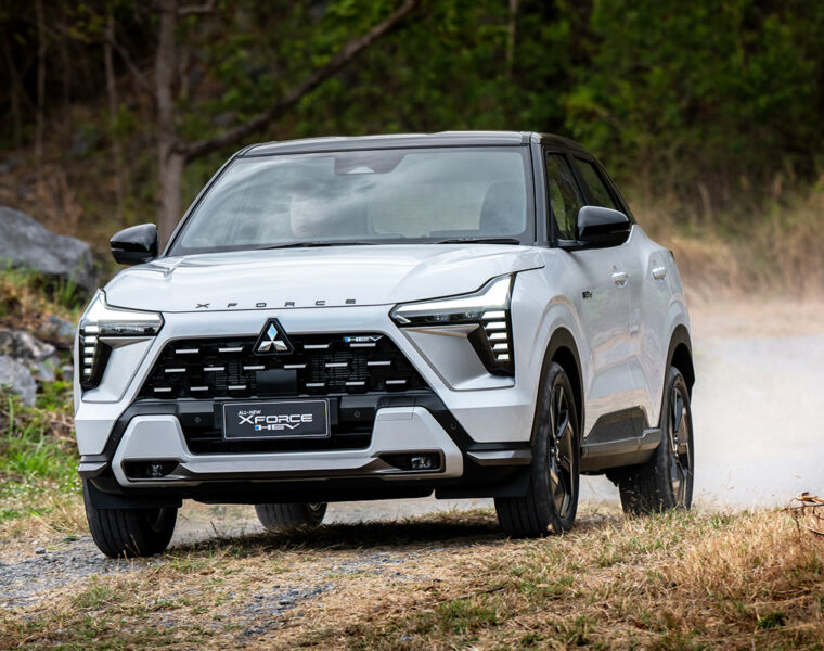 One of the company's cars driving on a rugged road