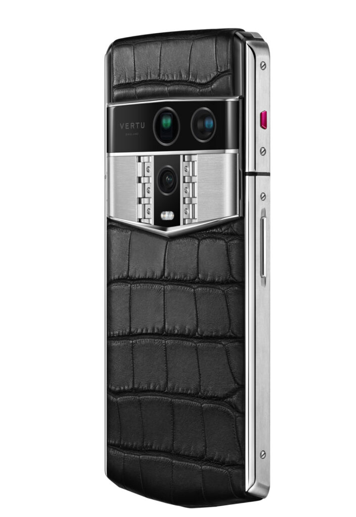 The rear of the phone encased in black crocodile leather