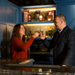 Lauren and Michael toasting with a dram