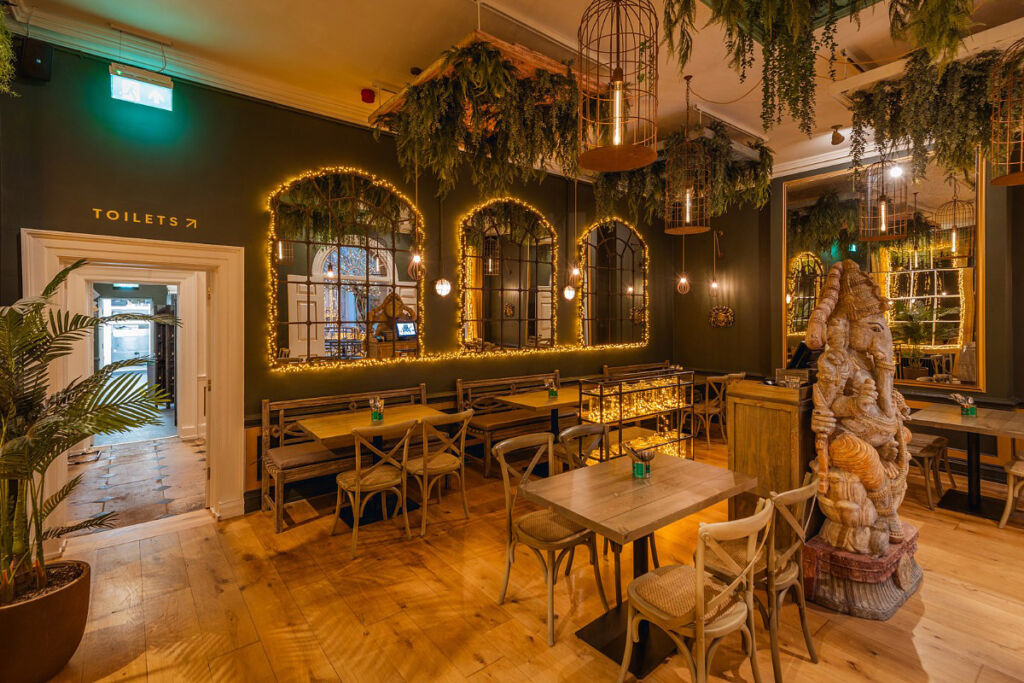 Pass the Chat Bombs: Mowgli Street Food’s Festive Feasts to Light Up Christmas 5 The Indian themed interior at one of the groups premises