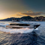 A side view of the boat running at speed